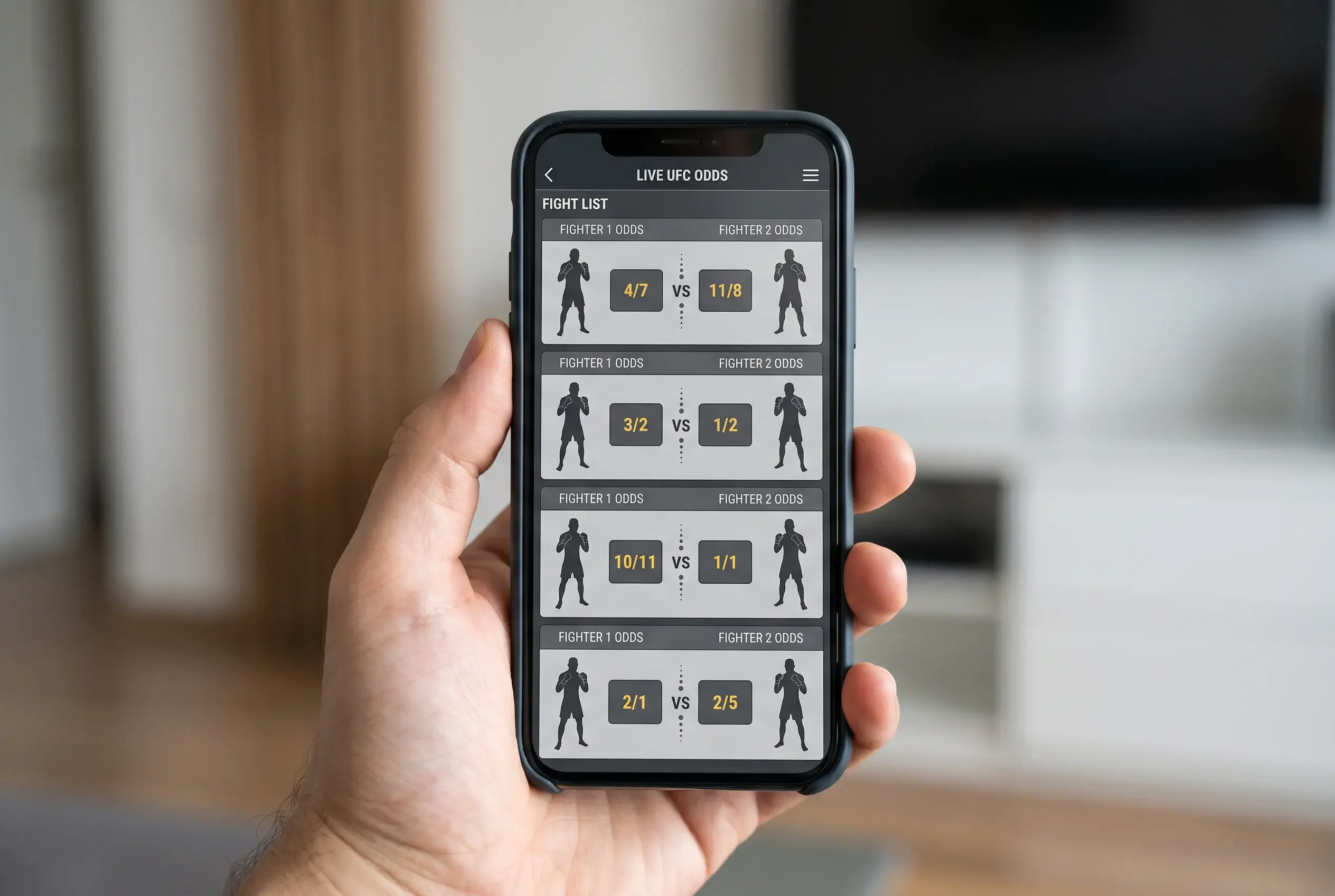 Hand holding a smartphone showing a UFC live odds screen with a vertical list of fight selections and odds in two columns